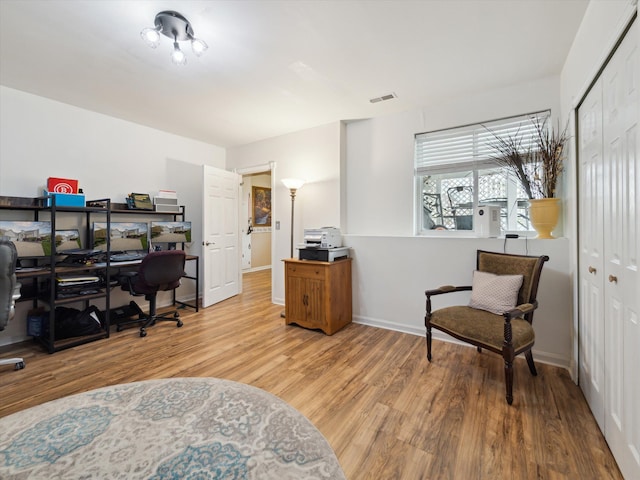 230 Atlantis Cir, Oxford, MI 48371 - home office with wood finished floors and baseboards
