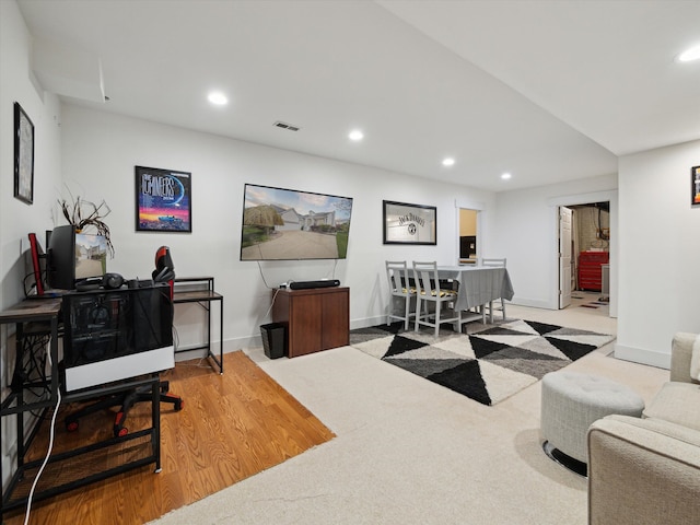 230 Atlantis Cir, Oxford, MI 48371 - living area featuring recessed lighting, wood finished floors, and baseboards