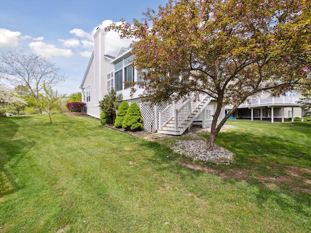 230 Atlantis Cir, Oxford, MI 48371 - view of grassy yard with stairs