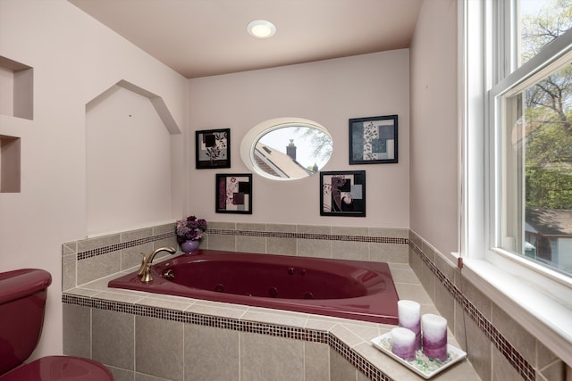 19985 Charest St, Detroit, MI 48234 - bathroom with healthy amount of natural light, a jetted tub, and toilet