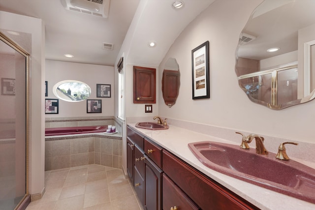 19985 Charest St, Detroit, MI 48234 - full bathroom with a shower stall, tile patterned flooring, a bath, double vanity, and recessed lighting