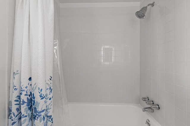 bathroom with shower / tub combo