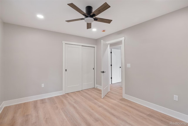 7598 Lake Park Rd, Ira, MI 48023 - unfurnished bedroom featuring baseboards, light wood-style flooring, recessed lighting, a closet, and ceiling fan