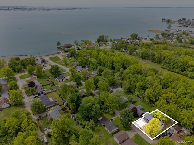 7598 Lake Park Rd, Ira, MI 48023 - aerial perspective of suburban area featuring a large body of water and property parcel outlined