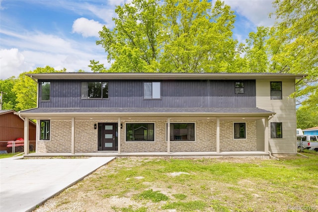 7598 Lake Park Rd, Ira, MI 48023 - view of front of house featuring a front yard and covered porch