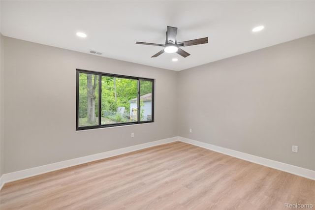 7598 Lake Park Rd, Ira, MI 48023 - unfurnished room featuring light wood-style floors, a ceiling fan, recessed lighting, and baseboards