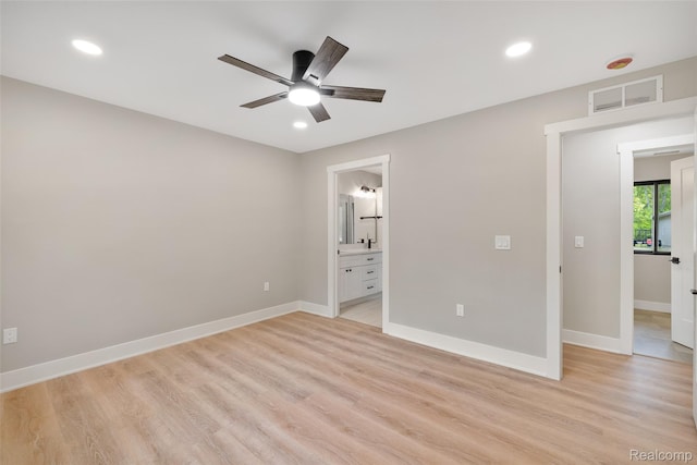 7598 Lake Park Rd, Ira, MI 48023 - unfurnished bedroom with recessed lighting, light wood-style floors, baseboards, connected bathroom, and a ceiling fan