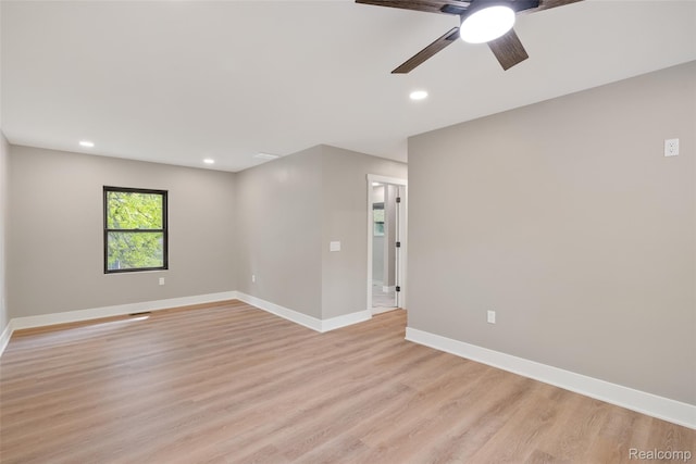7598 Lake Park Rd, Ira, MI 48023 - empty room with light wood finished floors, ceiling fan, baseboards, and recessed lighting