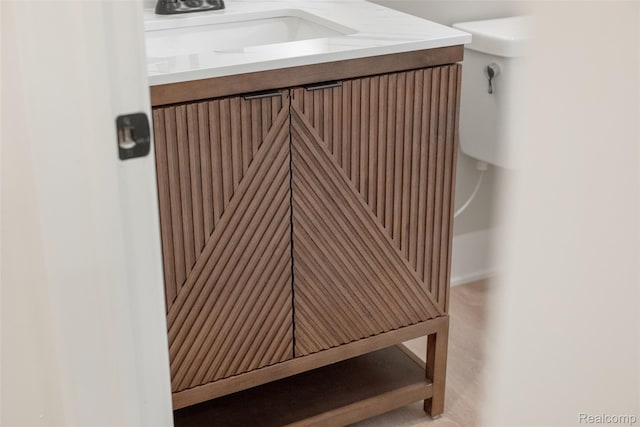 7598 Lake Park Rd, Ira, MI 48023 - bathroom view of vanity and toilet