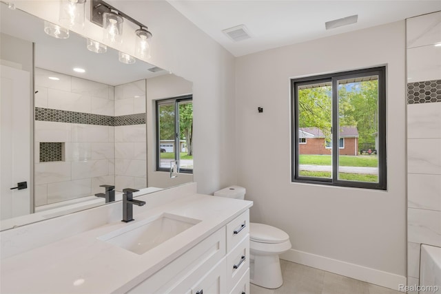 7598 Lake Park Rd, Ira, MI 48023 - bathroom with vanity, toilet, a tile shower, and plenty of natural light