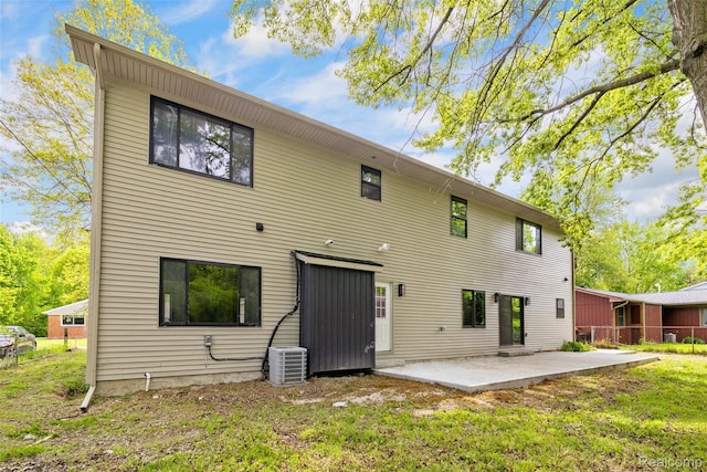7598 Lake Park Rd, Ira, MI 48023 - rear view of house featuring a patio area and central AC unit
