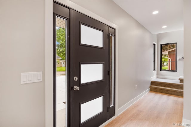 7598 Lake Park Rd, Ira, MI 48023 - entryway with light wood finished floors, plenty of natural light, baseboards, and recessed lighting