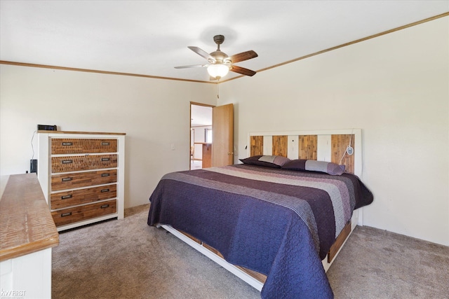 bedroom featuring carpet, ceiling fan, and crown molding