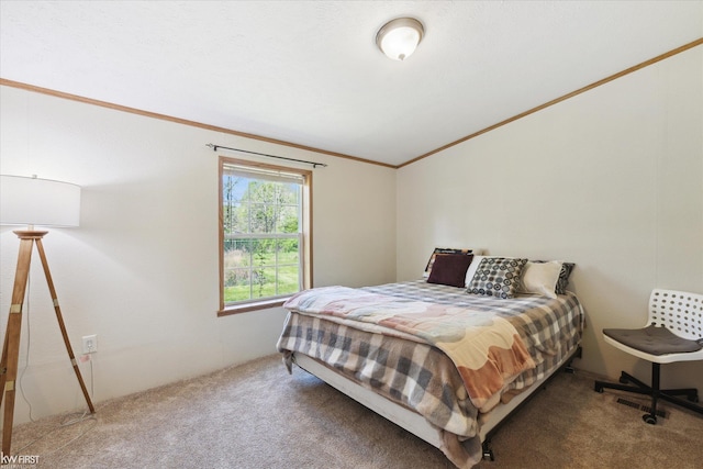 carpeted bedroom with crown molding and vaulted ceiling