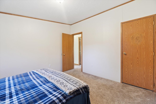 carpeted bedroom featuring ornamental molding