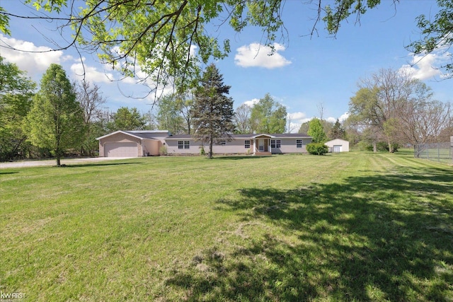 view of yard featuring a garage