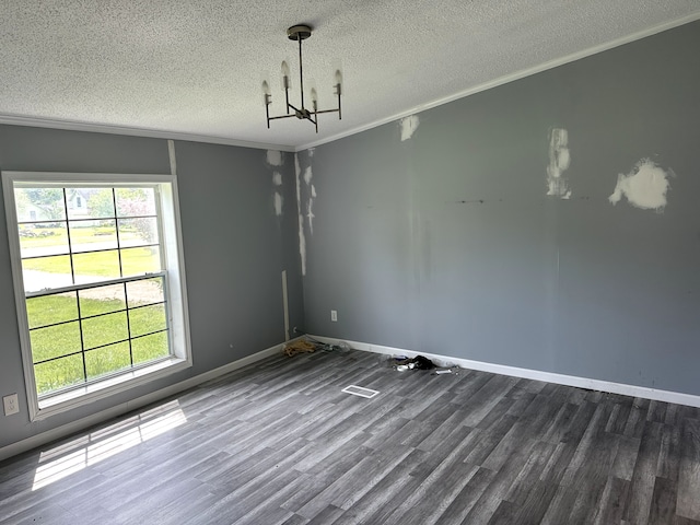 5151 Huntley Dr, Holly, MI 48442 - empty room with ornamental molding, a chandelier, a textured ceiling, dark wood finished floors, and baseboards