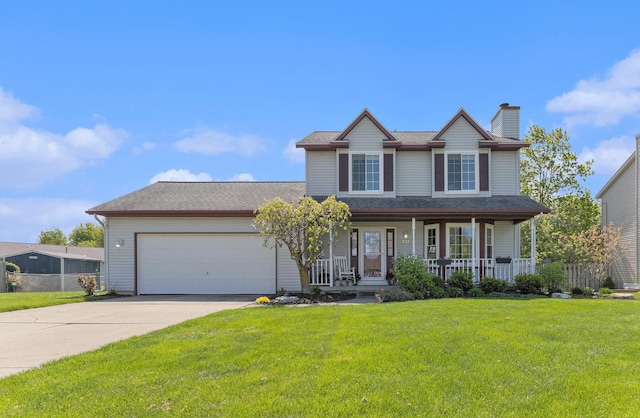 traditional-style house with covered porch, a chimney, a garage, and concrete driveway