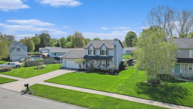 traditional-style house featuring driveway, covered porch, a garage, a residential view, and a chimney