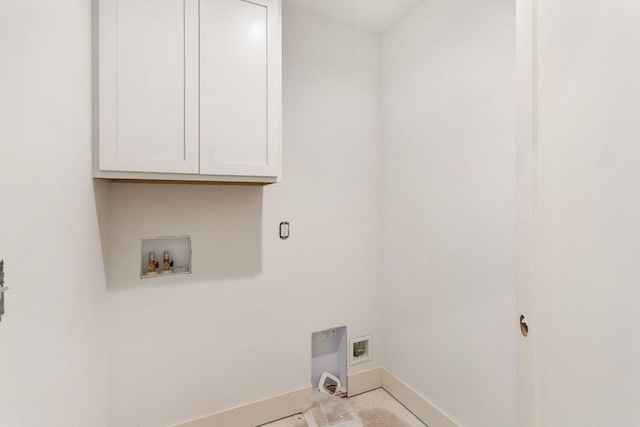 1826 S Barnes Rd, Muskegon, MI 49442 - washroom with baseboards, washer hookup, cabinet space, and electric dryer hookup