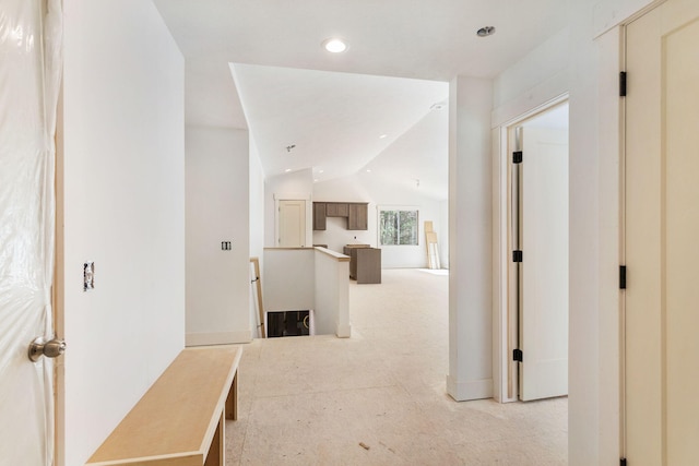 1826 S Barnes Rd, Muskegon, MI 49442 - hallway with lofted ceiling, an upstairs landing, and recessed lighting
