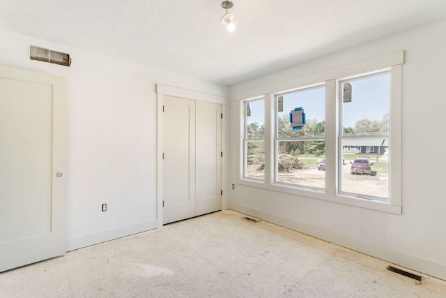 1826 S Barnes Rd, Muskegon, MI 49442 - unfurnished bedroom with baseboards