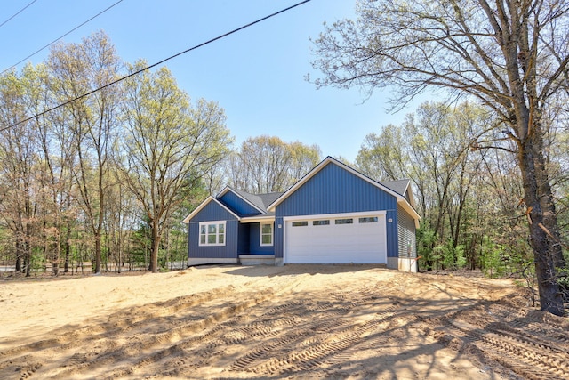 1826 S Barnes Rd, Muskegon, MI 49442 - ranch-style house featuring driveway and a garage