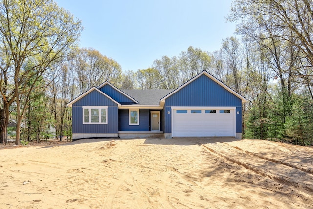 1826 S Barnes Rd, Muskegon, MI 49442 - single story home with a garage and dirt driveway