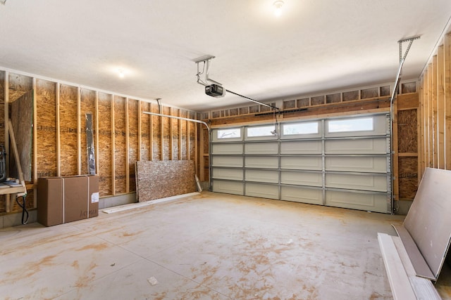 1826 S Barnes Rd, Muskegon, MI 49442 - garage featuring a garage door opener