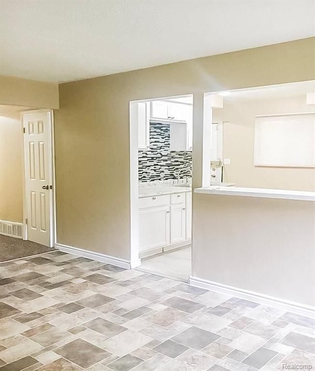 8090 Robson St, Detroit, MI 48228 - spare room with baseboards