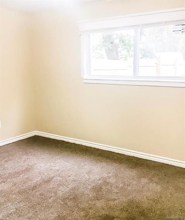 8090 Robson St, Detroit, MI 48228 - carpeted spare room with baseboards