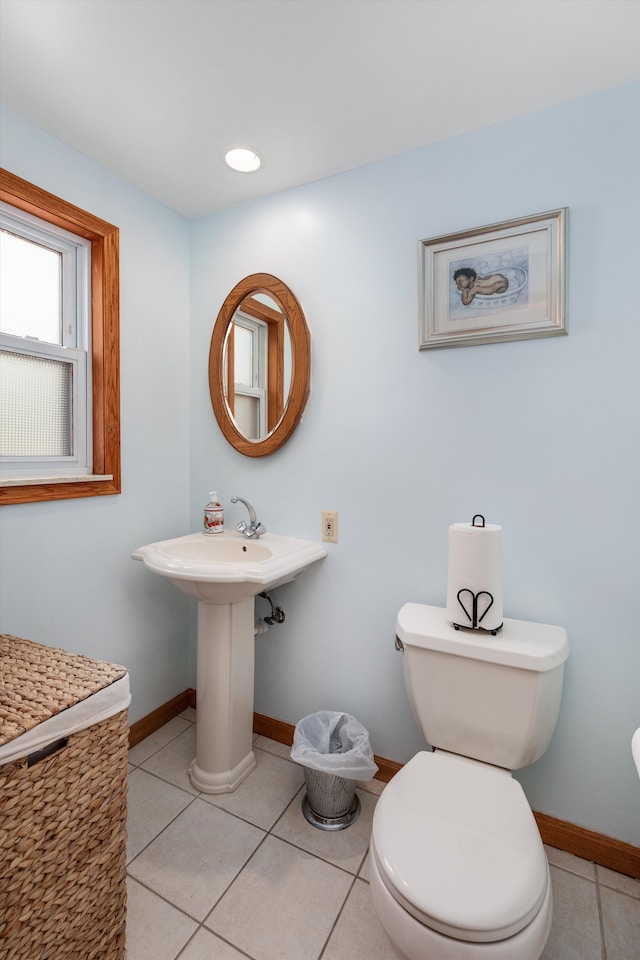 2220 Stanhope St, Grosse Pointe Woods, MI 48236 - half bath with toilet, tile patterned flooring, and baseboards