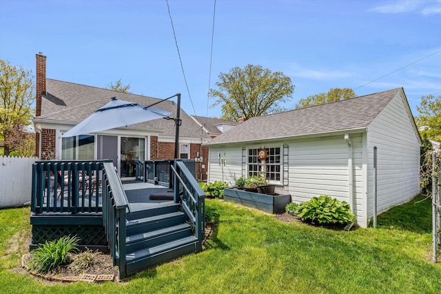 2220 Stanhope St, Grosse Pointe Woods, MI 48236 - rear view of property with a chimney, a wooden deck, roof with shingles, and brick siding