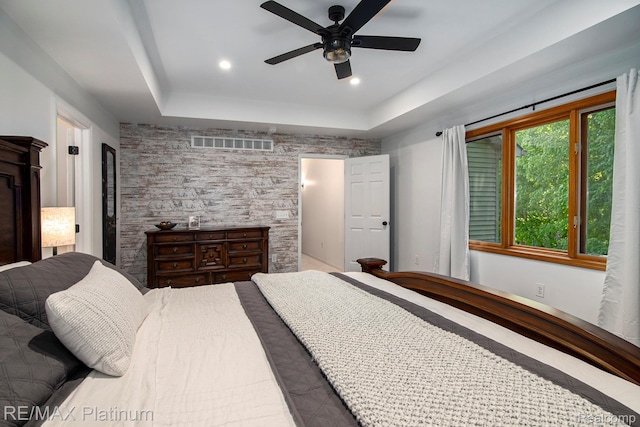 3873 Hartland Hills Dr, Hartland, MI 48353 - bedroom with a raised ceiling, recessed lighting, and ceiling fan