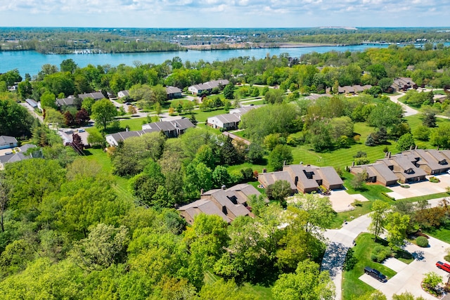 aerial perspective of suburban area featuring a large body of water