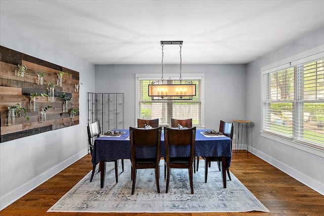 1836 Marywood Dr, Royal Oak, MI 48073 - dining room featuring a chandelier, baseboards, and wood finished floors