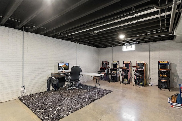 1836 Marywood Dr, Royal Oak, MI 48073 - office area featuring finished concrete flooring and brick wall