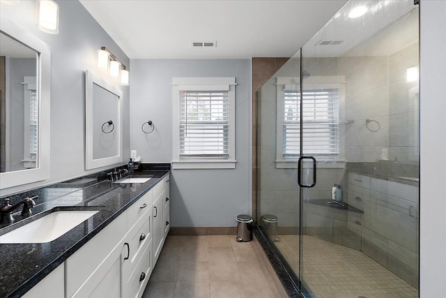 1836 Marywood Dr, Royal Oak, MI 48073 - bathroom with tile patterned flooring, a shower stall, baseboards, and double vanity
