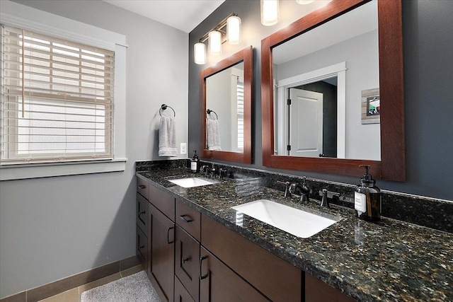 1836 Marywood Dr, Royal Oak, MI 48073 - full bathroom featuring double vanity, tile patterned flooring, and baseboards