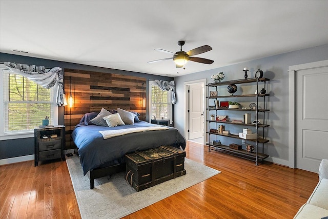 1836 Marywood Dr, Royal Oak, MI 48073 - bedroom with multiple windows, wood finished floors, baseboards, and a ceiling fan