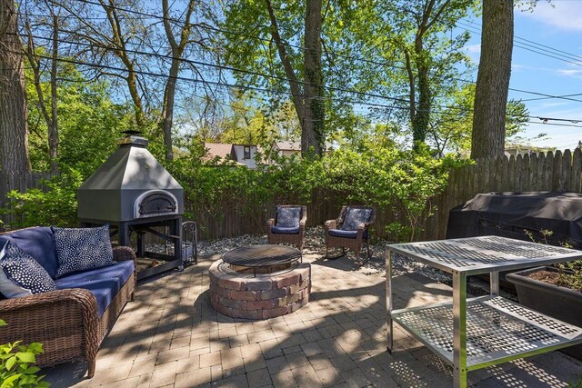1836 Marywood Dr, Royal Oak, MI 48073 - view of patio with an outdoor living space with a fire pit and a grill