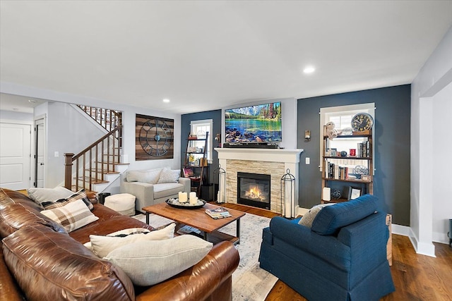 1836 Marywood Dr, Royal Oak, MI 48073 - living room with stairs, wood finished floors, a stone fireplace, baseboards, and recessed lighting