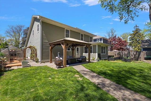 1836 Marywood Dr, Royal Oak, MI 48073 - back of property with an outdoor living space, an exterior structure, a gazebo, an outdoor structure, and a patio