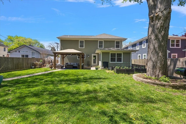 1836 Marywood Dr, Royal Oak, MI 48073 - rear view of property featuring an outdoor living space, a vegetable garden, a gazebo, and a patio area