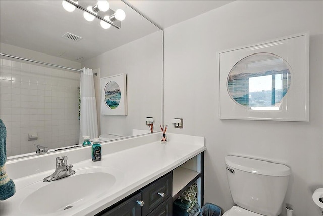 143 Campau Cir NW Unit 1616, Grand Rapids, MI 49503 - bathroom with toilet, vanity, and a shower with shower curtain