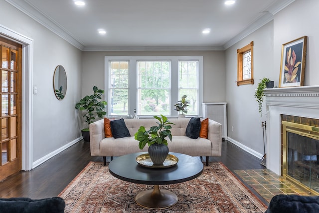2285 Chicago Blvd, Detroit, MI 48206 - living room with dark wood-style flooring, baseboards, a tiled fireplace, ornamental molding, and recessed lighting