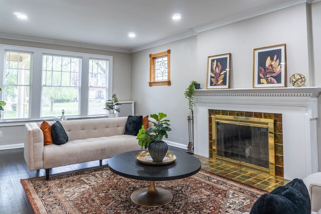 2285 Chicago Blvd, Detroit, MI 48206 - living room featuring baseboards, dark wood finished floors, ornamental molding, a tiled fireplace, and recessed lighting