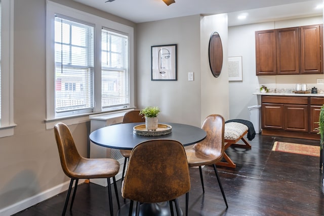 2285 Chicago Blvd, Detroit, MI 48206 - dining room featuring dark wood finished floors and baseboards