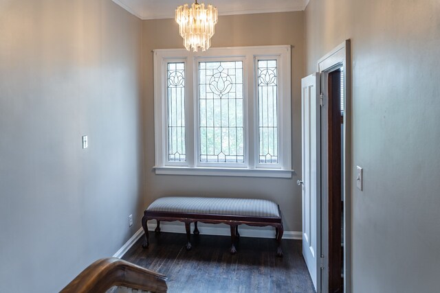 2285 Chicago Blvd, Detroit, MI 48206 - foyer with a chandelier, wood finished floors, baseboards, and crown molding