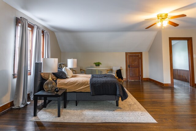 2285 Chicago Blvd, Detroit, MI 48206 - bedroom with lofted ceiling, dark wood-type flooring, and baseboards
